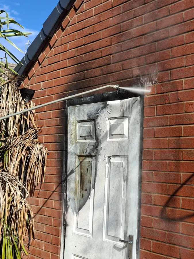 Pressure washing soot from brickwork
